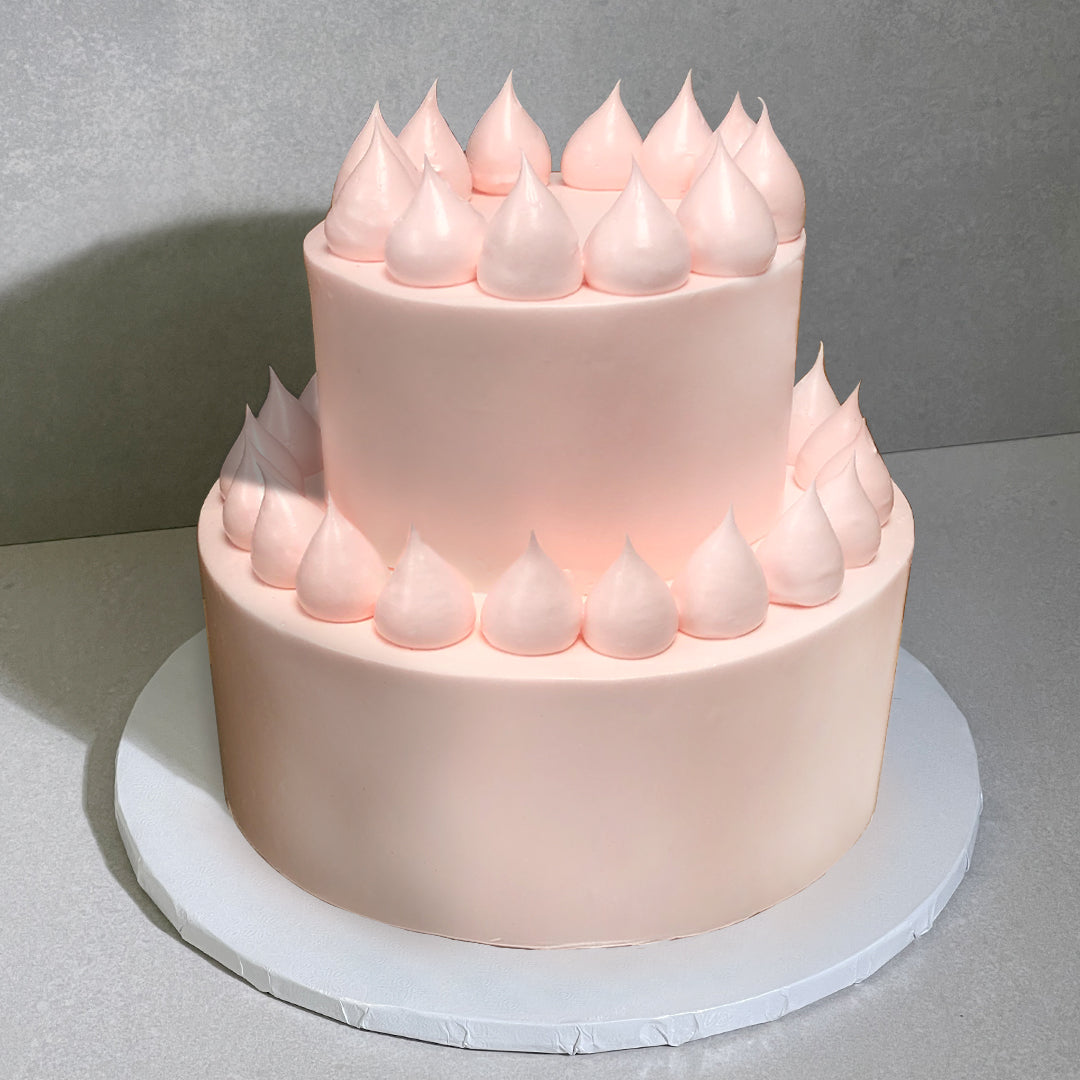 E9. Icing Dollop Tier Cake