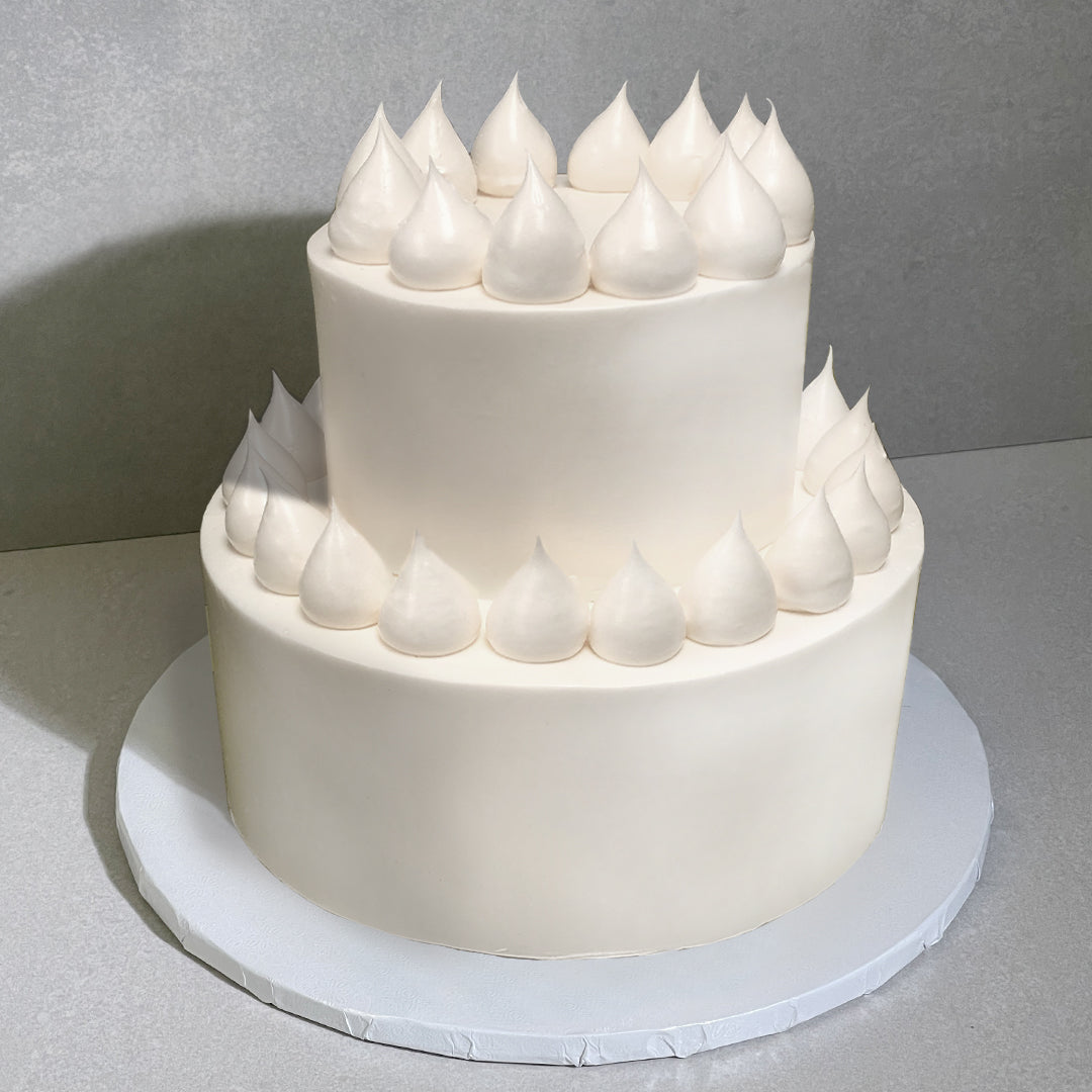 E9. Icing Dollop Tier Cake