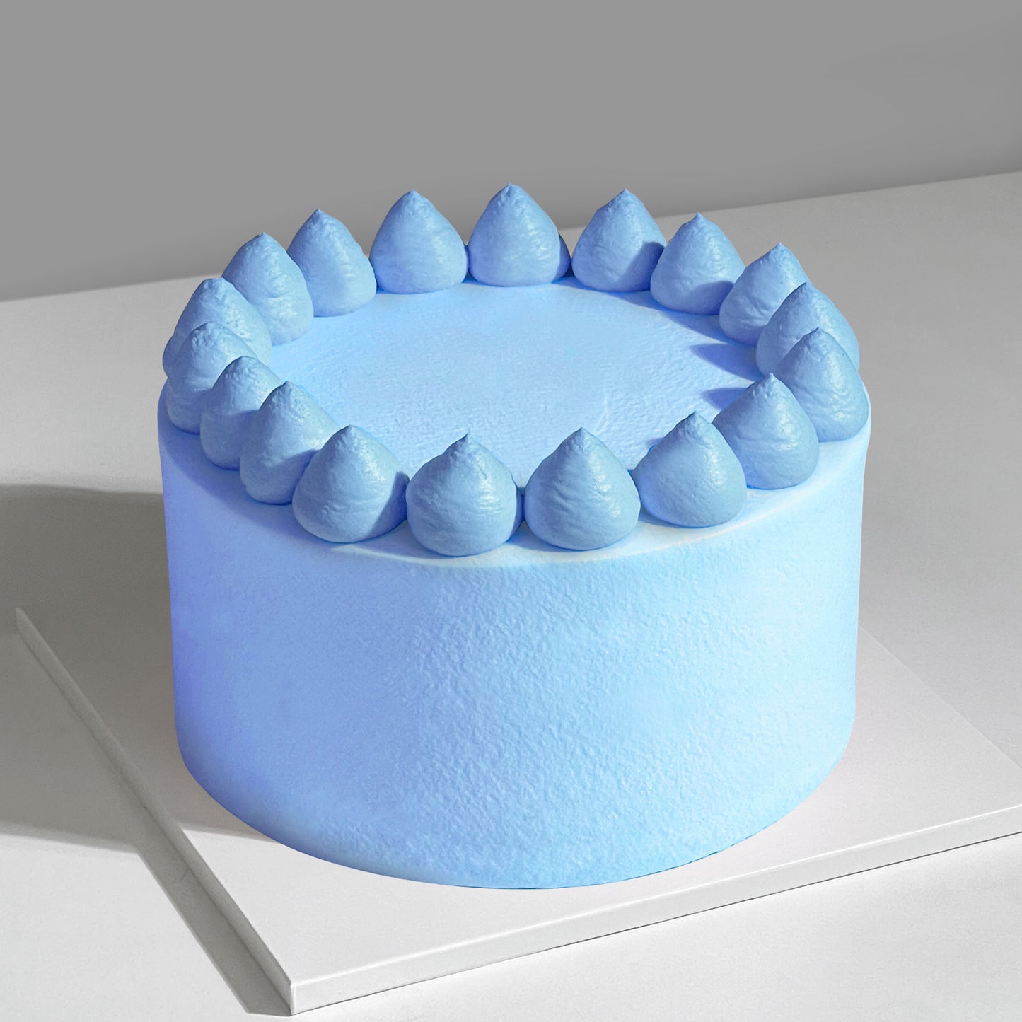 B7. Buttercream Icing Dollop Cake