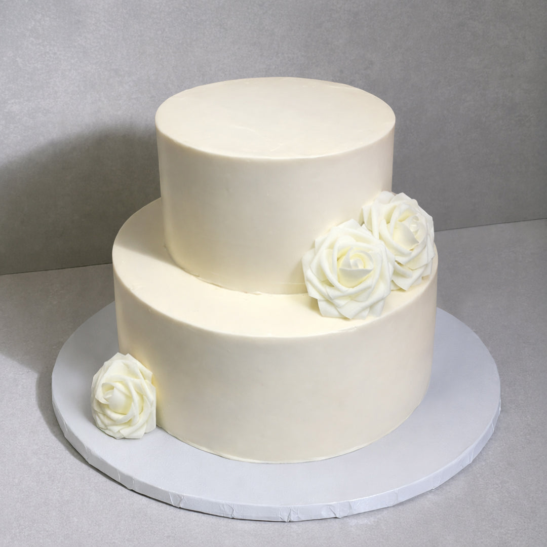 E10. Clean Icing Flower Tier Cake