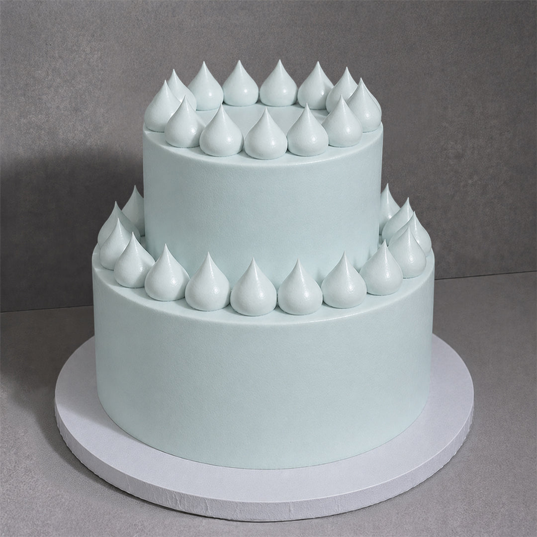 E9. Icing Dollop Tier Cake