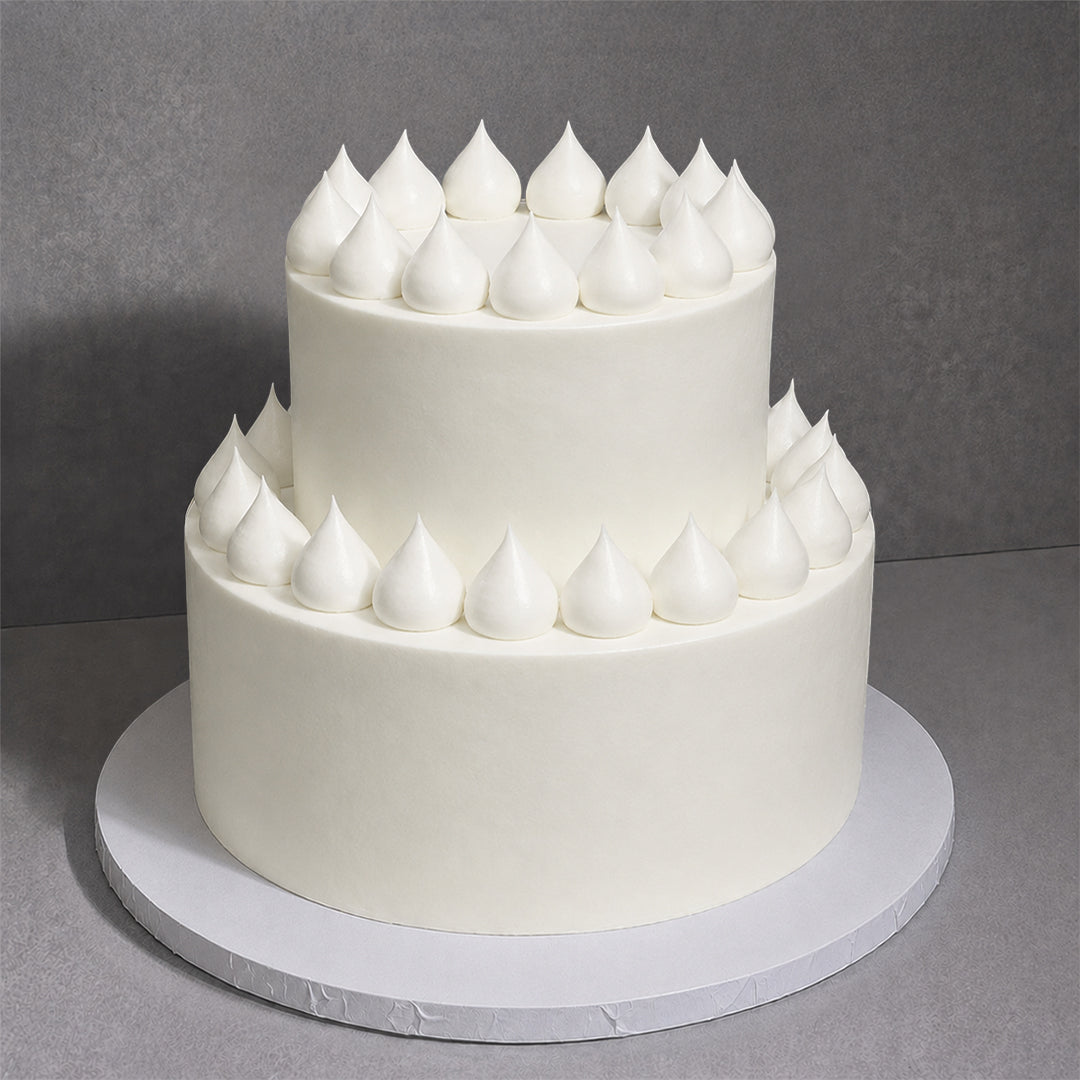 E9. Icing Dollop Tier Cake