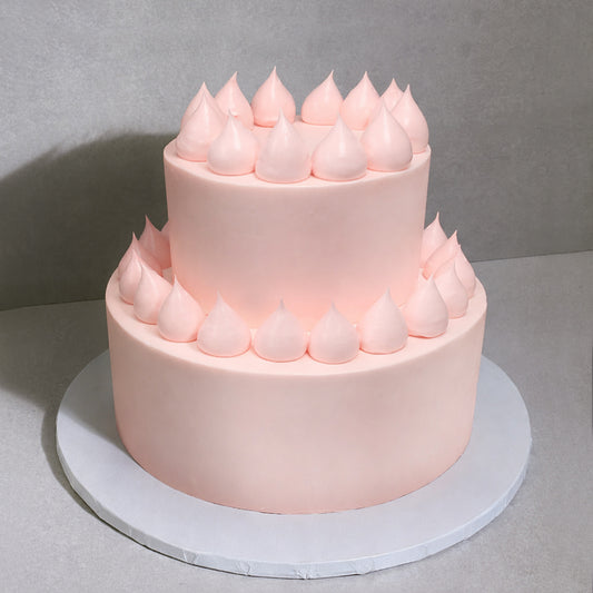 E9. Icing Dollop Tier Cake