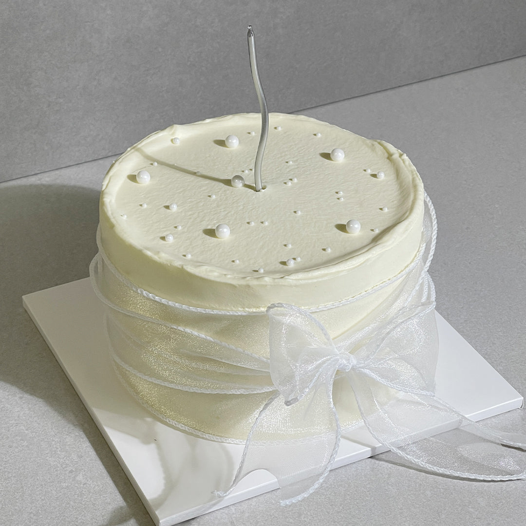 White With Pink Ribbon Cake